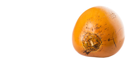 The Malayan Dwarf coconut over white background