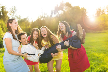 Groom with bridesmaids
