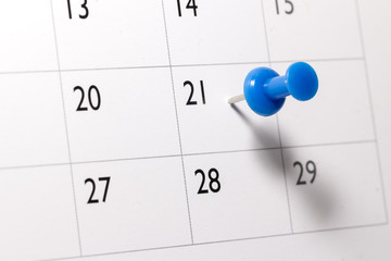 Blue pin on Calendar - Powered by Adobe