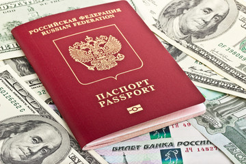 Fototapeta premium Russian passport on a background of money