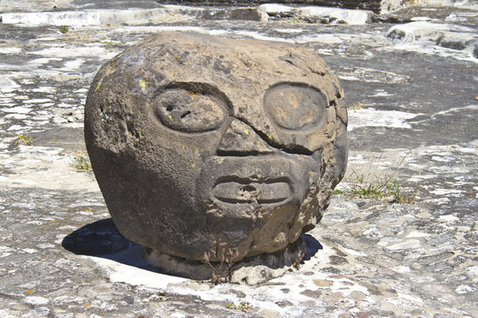Basalt head sculpture in Cholula, Mexico