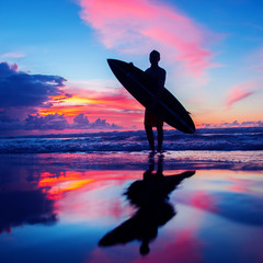 Surfer with board