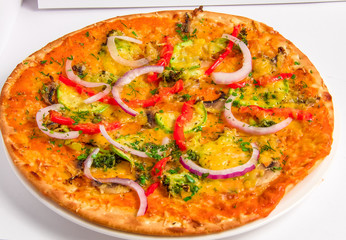 Tasty italian Pizza with zucchini and peppers