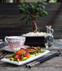 Gentle salad with a salmon, a squid