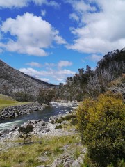 Naklejka na ściany i meble River in the Snowy mountains in Australia