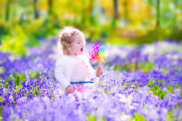 Little girl in a spring forest