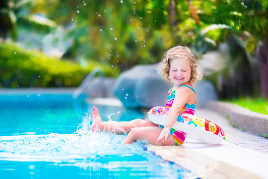 Little girl in a swimming pool