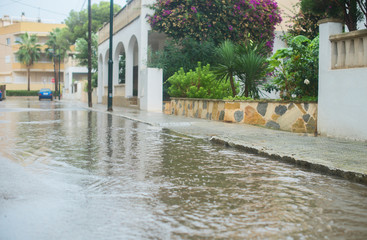 Fototapeta na wymiar Drops of heavy rain in the city.