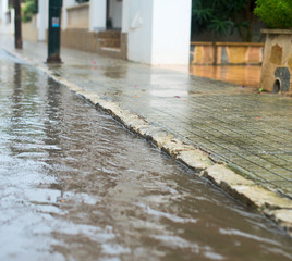 Drops of heavy rain in the city.