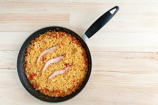Spanish rice or paella with prawns and fish