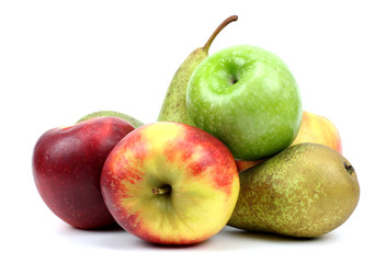 Fresh pears and apples on a light background