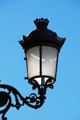 Fototapeta na wymiar Wrought iron street lantern, Spain © Arena Photo UK