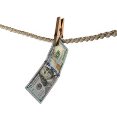 Dollar bill is hanging on a rope with wooden clothespin. Isolate