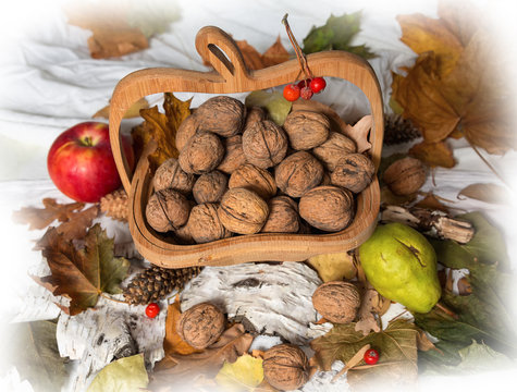 Autumn theme. Walnuts and apples