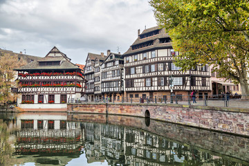 Traditional half-timbered houses reflecting in water, Strasbourg