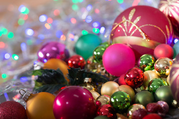 Fototapeta na wymiar christmas balls on bokeh background color
