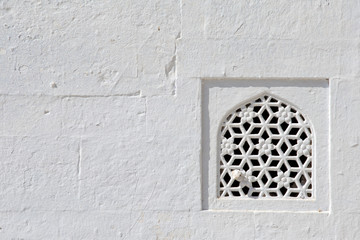 Detail of a wall of a temple in Pushkar, Rajasthan, India
