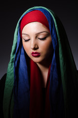 Portrait of the young woman with headscarf