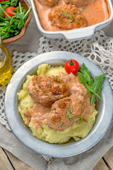 Cabbage and meat balls in tomato sauce