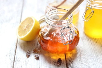 Fresh honey on wooden table