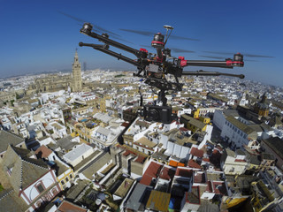 Drone flying over the roofs of Seville
