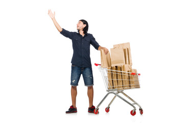 Man shopping with supermarket basket cart isolated on white