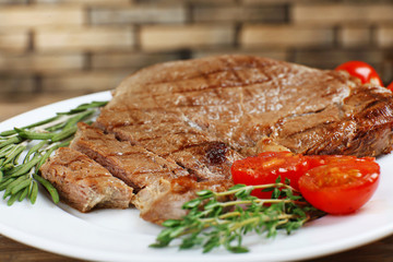 Delicious grilled meat on table, close-up