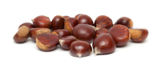 sweet chestnuts isolated on white