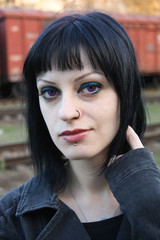 Obraz premium Girls near rails and wagons