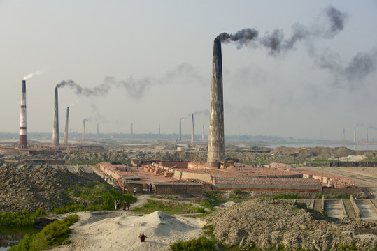 Polluting air brick factory pipes at Dhakka, Bangladesh.