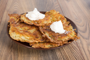 potato pancakes with sour cream