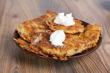 potato pancakes with sour cream