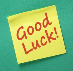 Good  Luck message written on a yellow sticky note