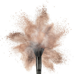 White powder explosion isolated on black