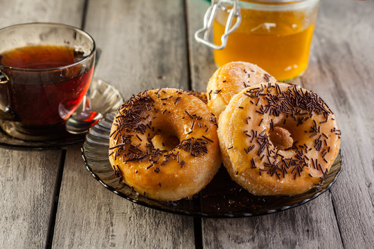 Breakfast with donuts and honey
