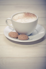 Cup of espresso and biscotti
