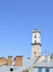 tower over roofes of the houses