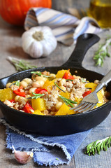 Stew from pumpkin,beans and ground meat with rosemary.