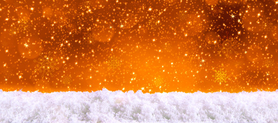 Golden christmas background and white snow.