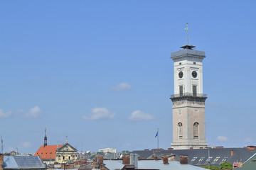 Obraz premium horologium over roofes at old town