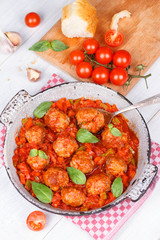 Meatballs with tomato sauce in a pan