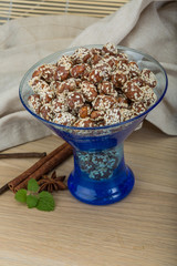 Peanut in honey with sesame seeds
