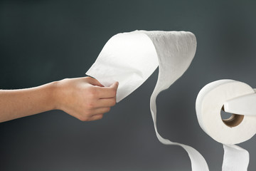 Yanking the toilet paper.