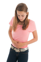 Fototapeta premium Teen girl with stomach ache