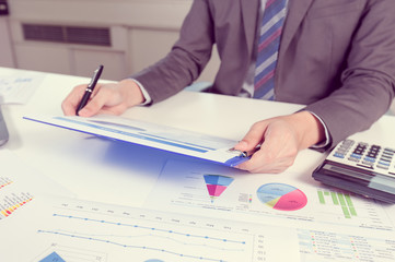 Businessman show analyzing report, business performance concept