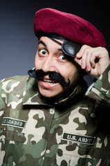 Funny soldier in military concept