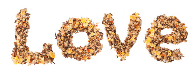 Horse sportive muesli as word LOVE. over white