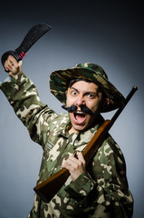 Funny soldier in military concept