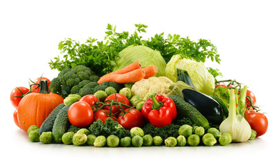 Assorted raw organic vegetables isolated on white