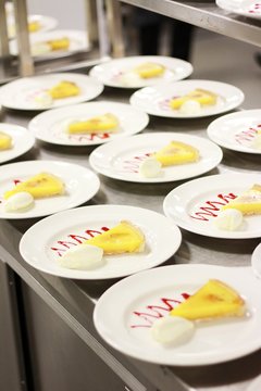 plated lemon tarte au citron in kitchen